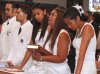 JOEL CHIN  MOTHER JULIET CHIN  HOLDS BIBLE  WITH HER SURRONDED BY OTHER SONS AND DAUGHTERS  AT M.jpg